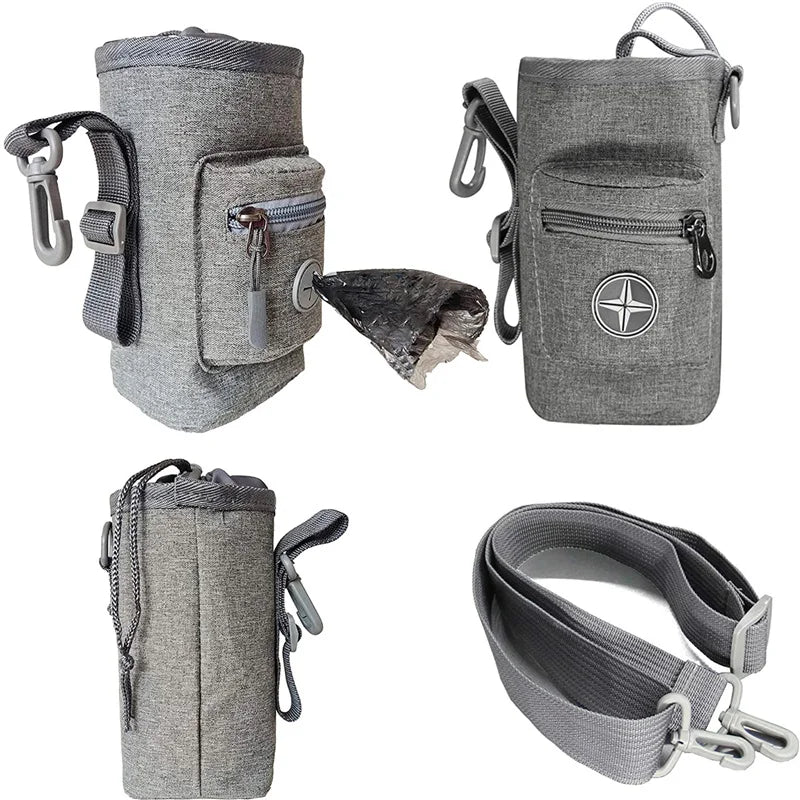Gray Dog treat bag with multiple compartments and a strap on a white background
