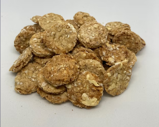 Stack of pet treats on a white background