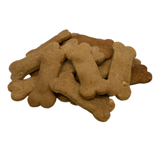 Stack of brown dog treats on a white background