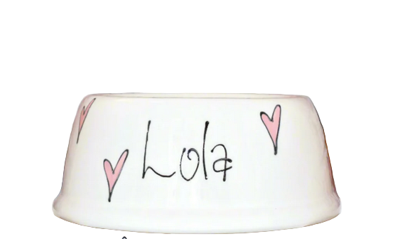 White pet bowl with 'Lola' and heart designs on a white background